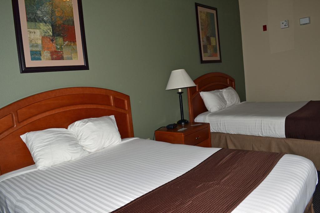 Paola Inn And Suites Habitación foto