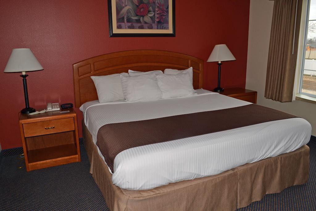 Paola Inn And Suites Habitación foto