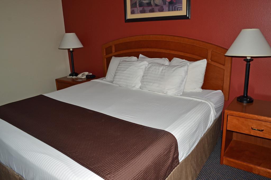 Paola Inn And Suites Habitación foto