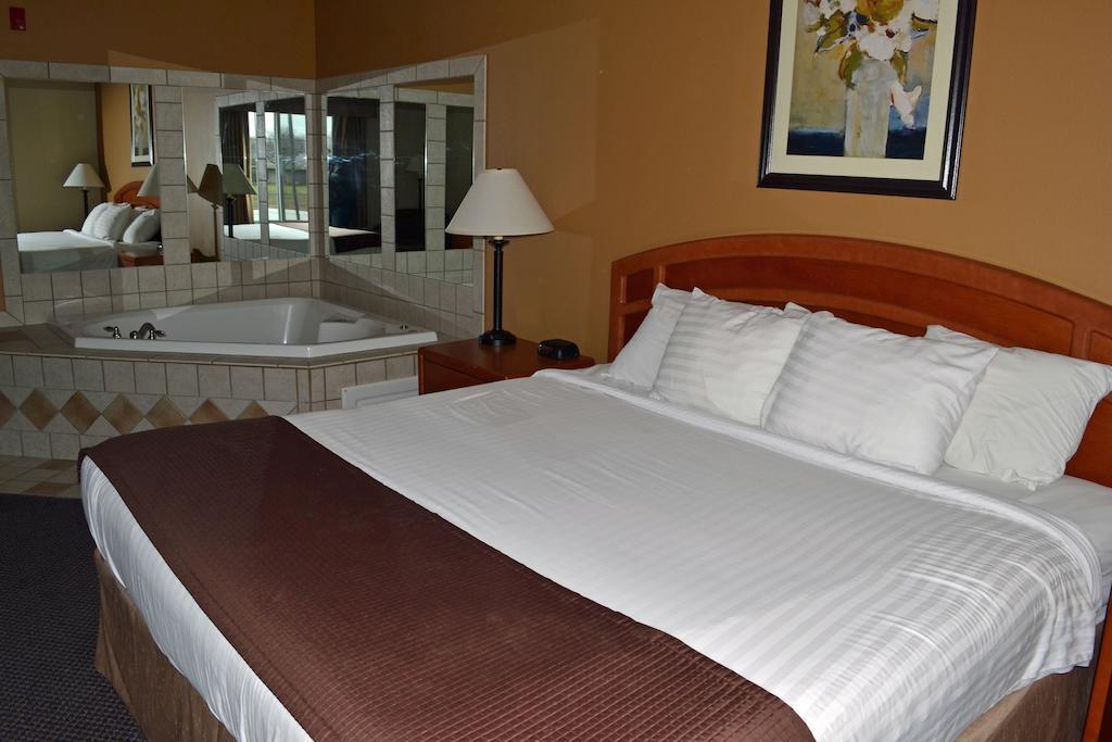 Paola Inn And Suites Habitación foto